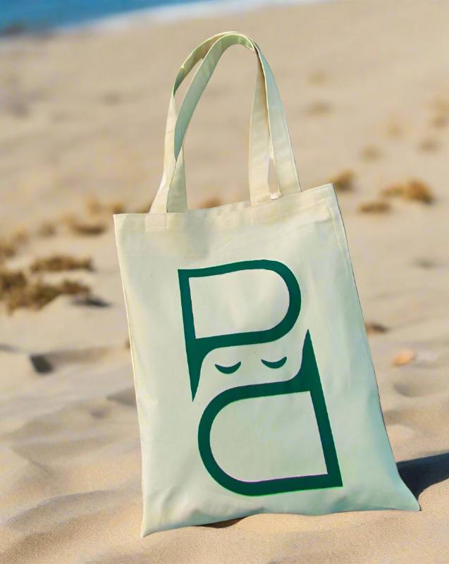 Spacious canvas tote bag with reinforced handles, featuring a minimalist floral design and an inner pocket for small items